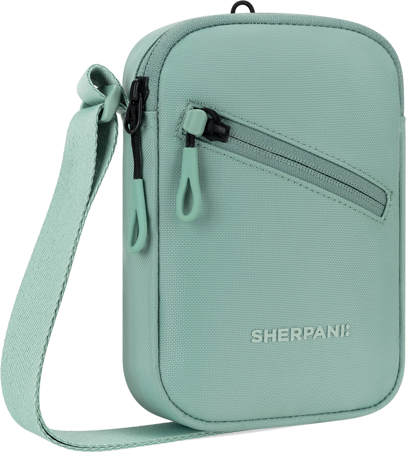 Quarter turn view Women's Sherpani Hand Bag style name Rogue in color Surf. Sku: 26-ROGUE04110
