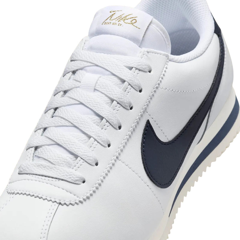 Women's Cortez Oly White/Obsidian-Sail (HJ9343 100)